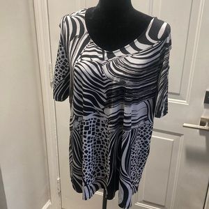 Breezy “cold shoulder” blouse- note the cold shoulder sleeves with silver rings!